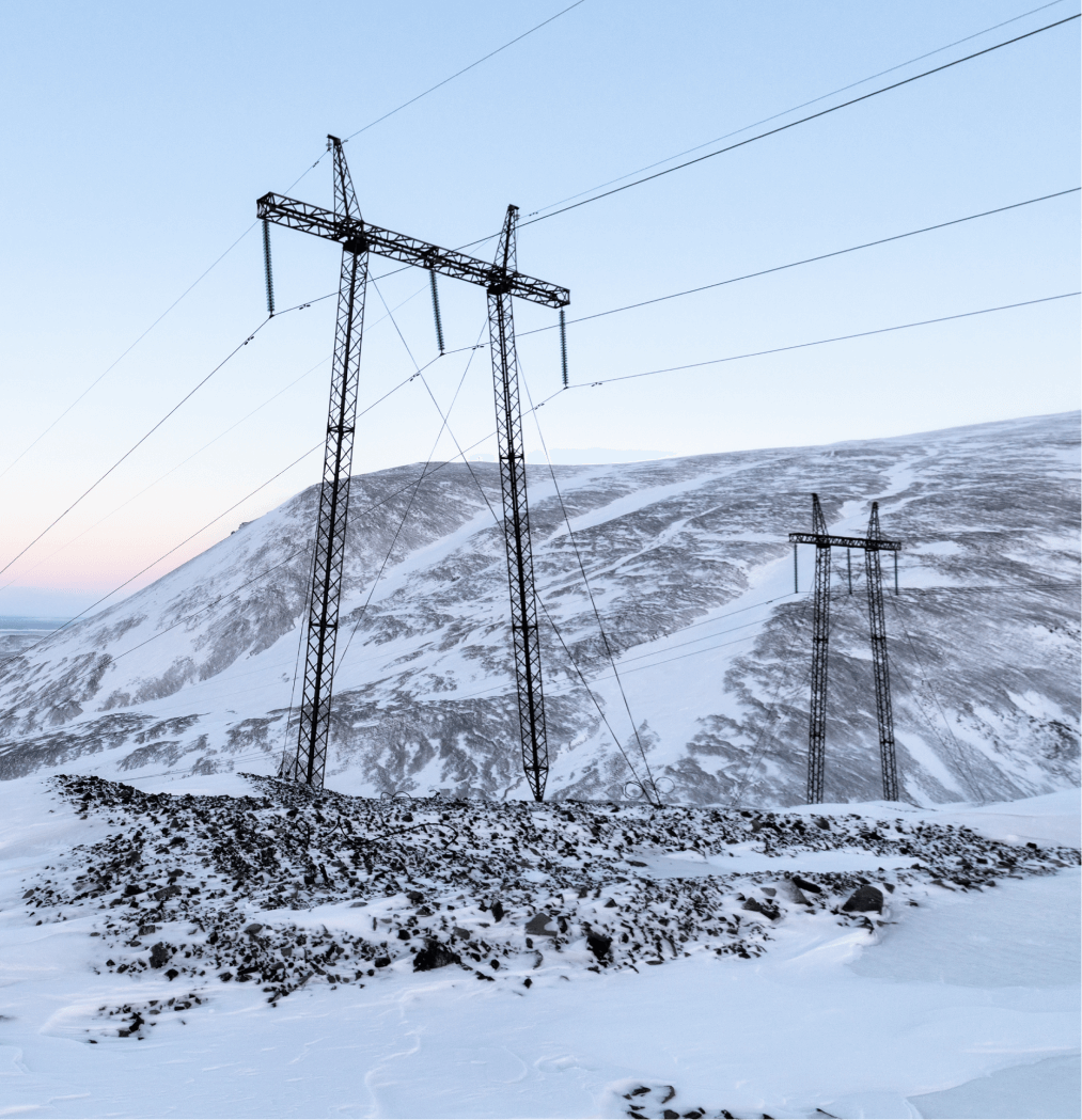 power line in snowy mountains