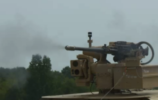 Tank firing gun with wind sensor helping ballistic control